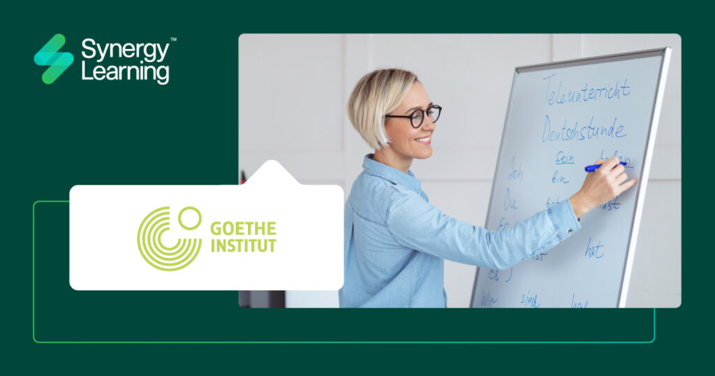 woman writing on a whiteboard in german