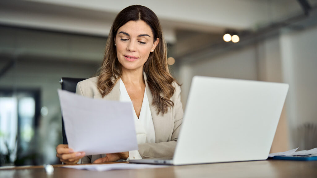 professional woman working at a computer