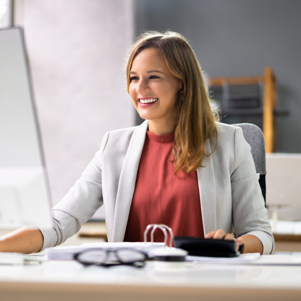 professional woman working on a laptop
